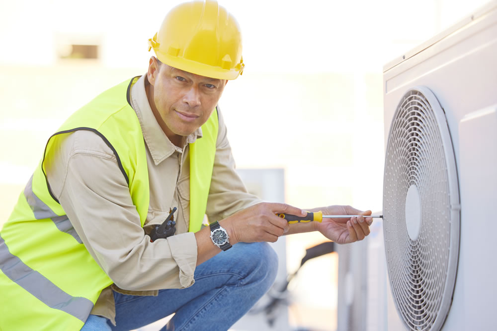 air conditioner repair and portrait of man on roo 2023 01 19 00 18 15 utc